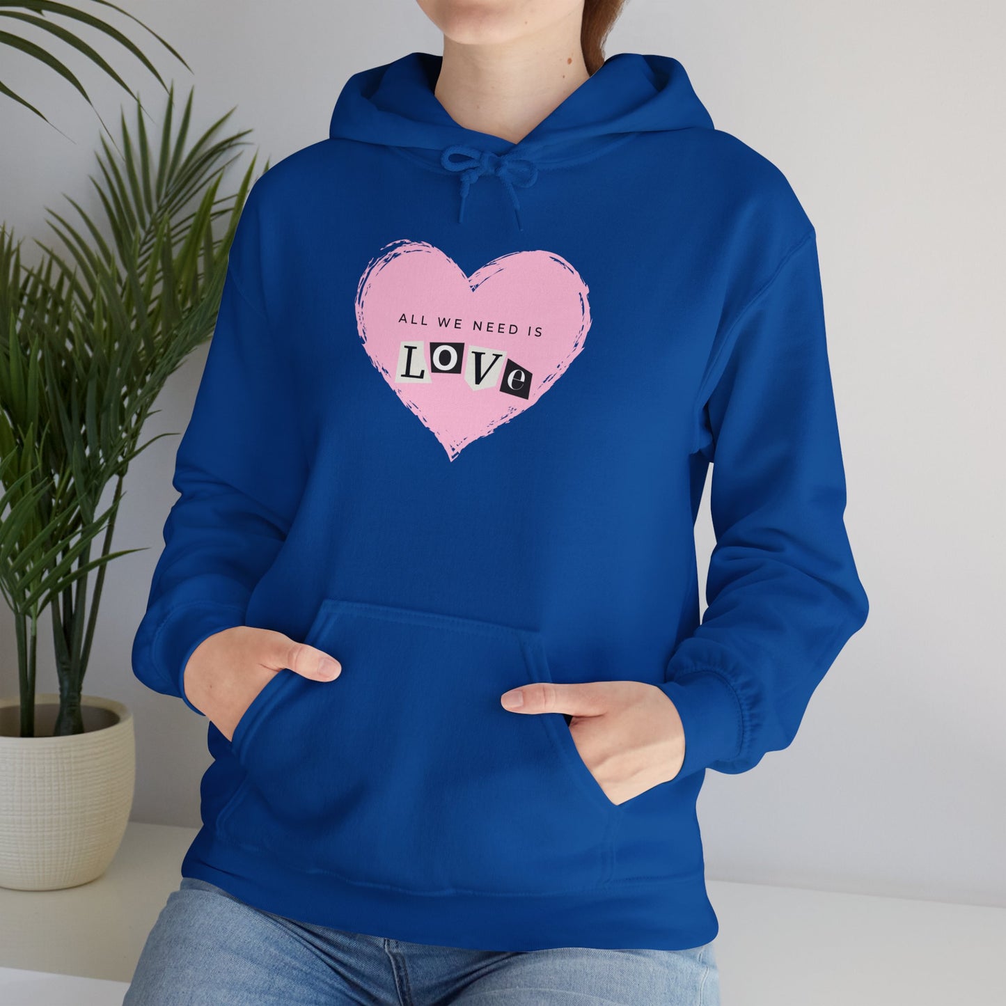"All we need is love" Unisex Heavy Blend™ Hooded Sweatshirt