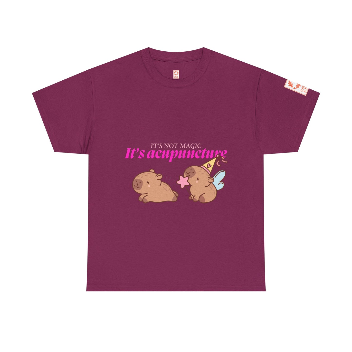 Maroon t-shirt with capybaras and text: It's Not Magic, It's Acupuncture