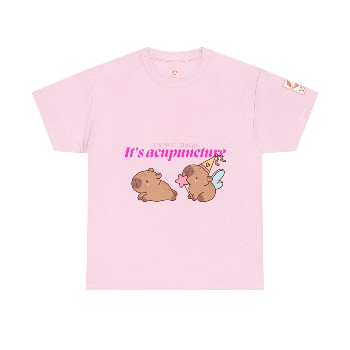 Pink t-shirt with capybaras and text: It's Not Magic, It's Acupuncture