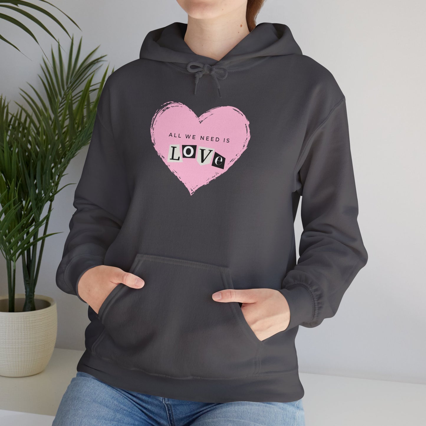 "All we need is love" Unisex Heavy Blend™ Hooded Sweatshirt